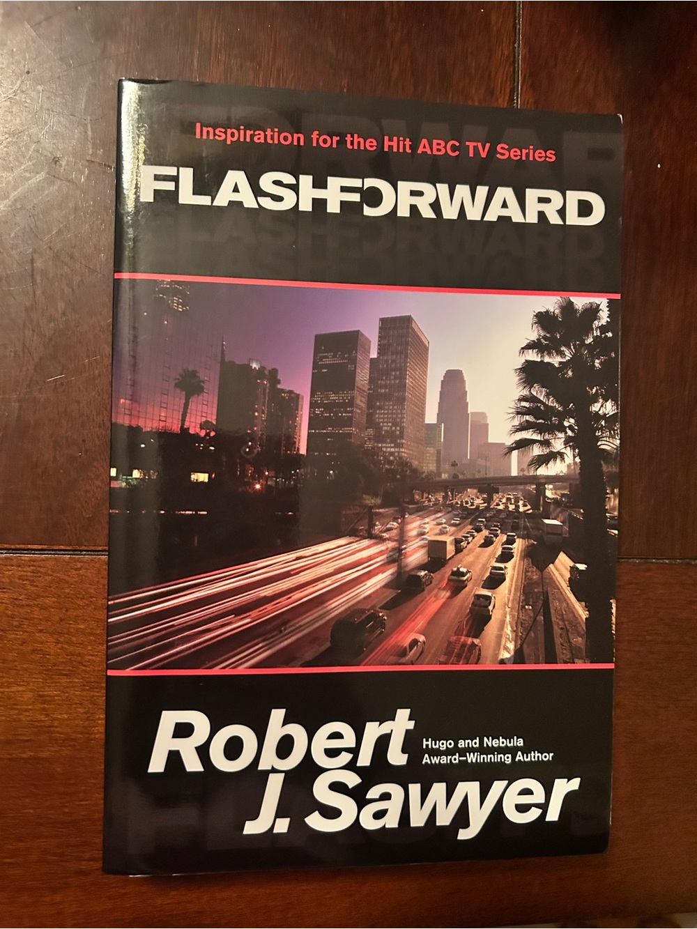 FlashForward by Robert J. Sawyer - Black & Purple Cityscape Hardcover